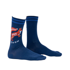 Lifestyle shot showing the 'Zero Fox Given' socks on a person's feet.  The socks are navy blue with a fox design and blue stripes near the cuffs.