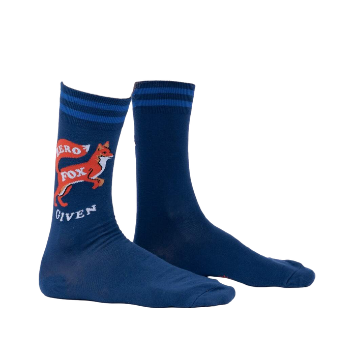 Lifestyle shot showing the 'Zero Fox Given' socks on a person's feet.  The socks are navy blue with a fox design and blue stripes near the cuffs.