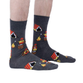 Lifestyle shot showing the socks on a person's legs, showcasing the fit and design in a natural setting.