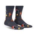 Pair of crew socks in dark gray featuring beavers roasting marshmallows around a campfire with small orange tents. Fun and whimsical design.