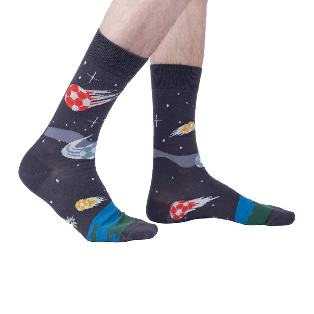 Lifestyle shot showing 'Lets Kick It' socks on a person's feet, highlighting the fit and overall look.