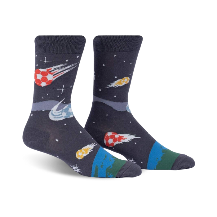 dark gray crew socks featuring blazing soccer balls flying through space towards a distant planet. (for men)  