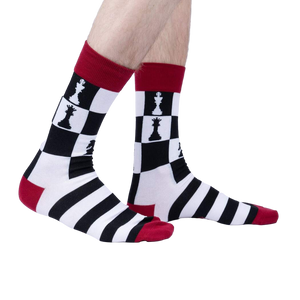 Lifestyle shot showing 'Check Yeah' socks on a person's legs against a white background.