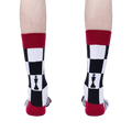 Rear view of model wearing 'Check Yeah' socks, showcasing the back design and color details.