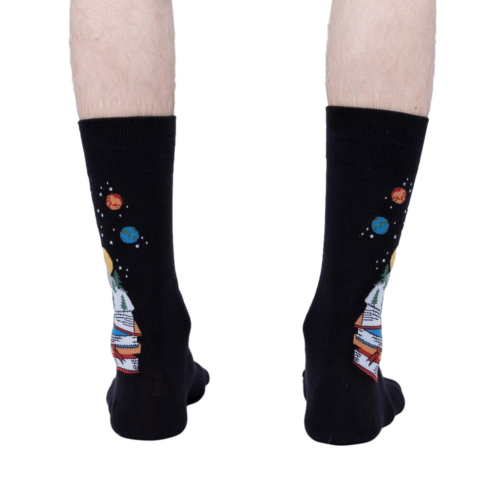Rear view of the socks on a person's legs, highlighting the design on the back of the socks.