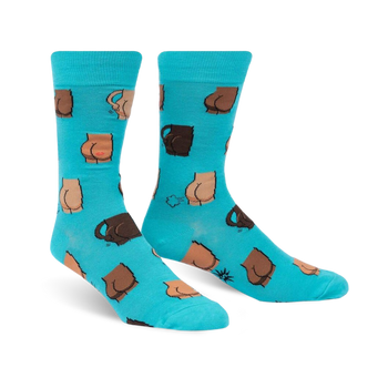 A pair of teal crew socks with a fun pattern of illustrated buttocks in various shades of brown. 