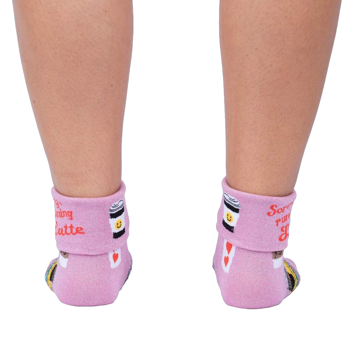 Back view of the socks on a person's legs, showcasing the rolled-down cuff message.