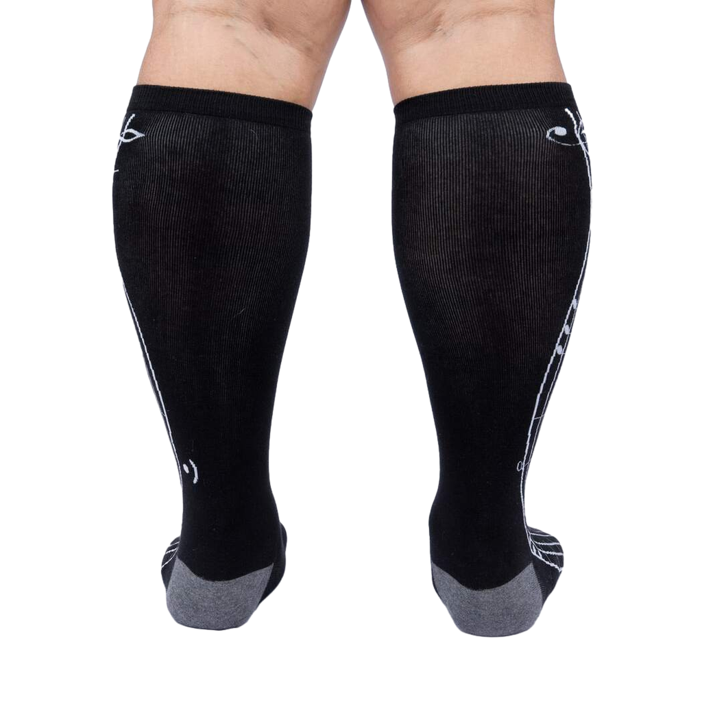 Rear view of the 'Music Is My Forte' knee-high socks, showcasing the design from the back.