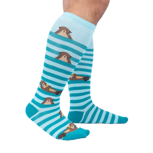 Lifestyle shot showcasing the 'My Otter Foot' knee-high socks on a model's legs, highlighting their fit and appearance.