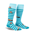 Pair of teal and light blue striped knee-high socks featuring adorable sea otter illustrations.