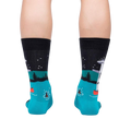 Rear view of the socks on a model's legs; showing the back design details.