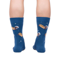Rear view of the 'Weiner Dogs, In Space!' socks on a person's legs.