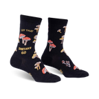 Pair of black crew socks with a whimsical mushroom and 'Let That Shiitake Go' design. Red and gold mushrooms are scattered across the black fabric.