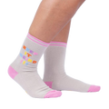 Lifestyle shot showcasing 'Keep It Weird!' socks on a person's legs, highlighting the fit and style.