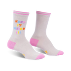 Pair of grey crew socks with a multicolored 'Keep It Weird!' text design and pink cuffs. 