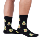 Lifestyle shot showing the socks on a person's legs.  The socks are black with a pattern of avocado cats.