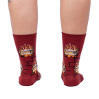 Rear view of the Yule Log socks, showcasing the full design on the back of the socks.