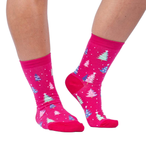 Lifestyle shot showing Feelin' Pine socks on a person's legs against a white background.