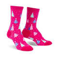 Pair of fuchsia crew socks with a pattern of pastel blue, pink, and green Christmas trees and white snowflakes.
