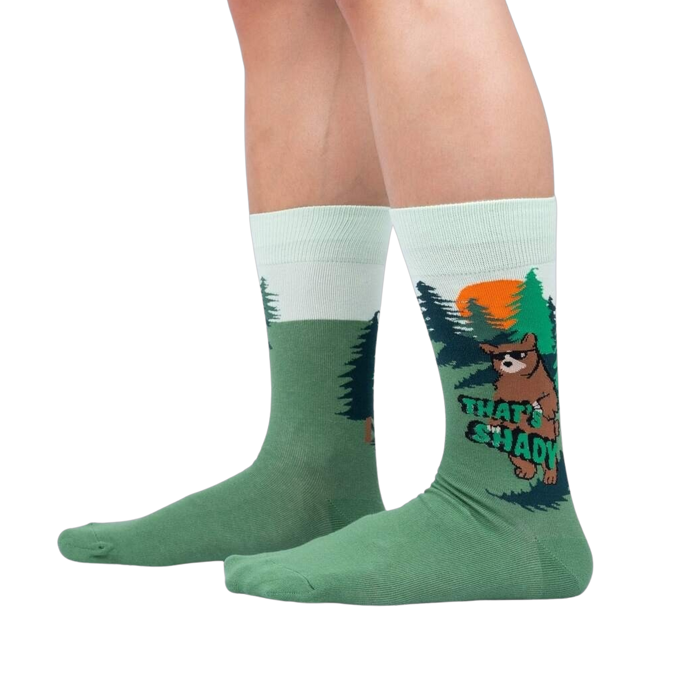 Lifestyle shot of a person wearing a pair of 'That's Shady' socks, showcasing the fit and design on the leg.