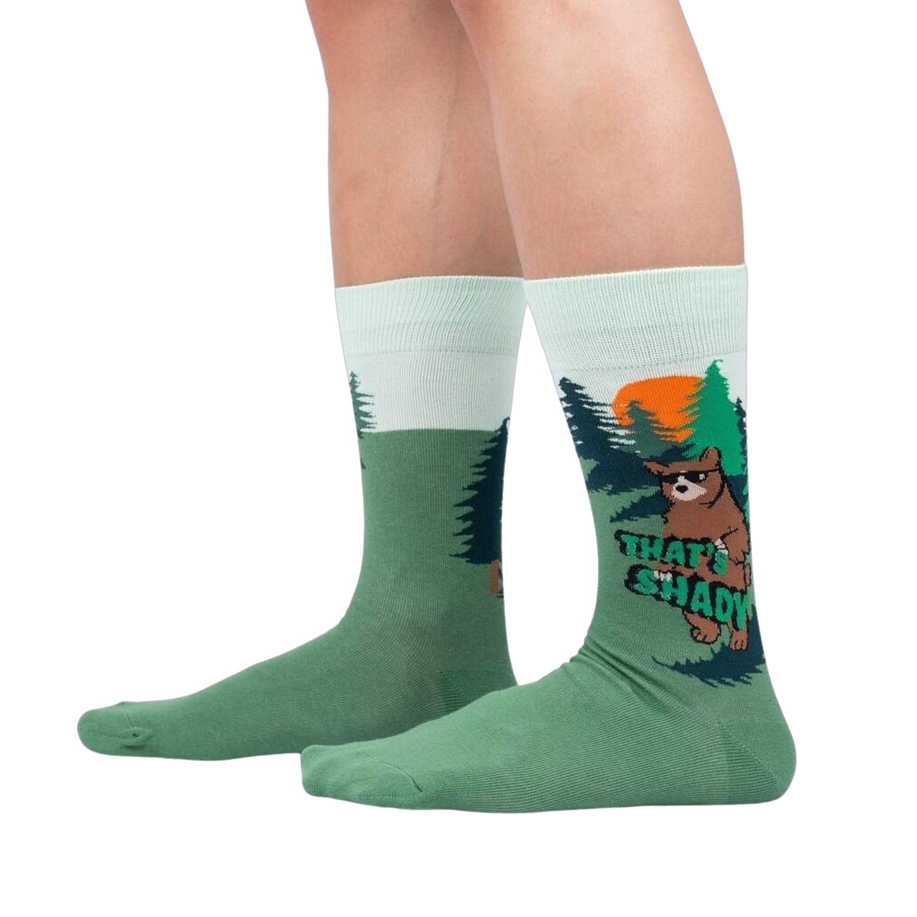Lifestyle shot of a person wearing a pair of 'That's Shady' socks, showcasing the fit and design on the leg.