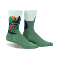 Crew socks in green and mint green featuring a cartoon bear in a forest scene. The bear holds a sign that says 'That's Shady'.