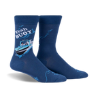 A pair of blue crew socks with a whimsical illustration of a boat, text that says 'Yeah Buoy!', and seagull accents.