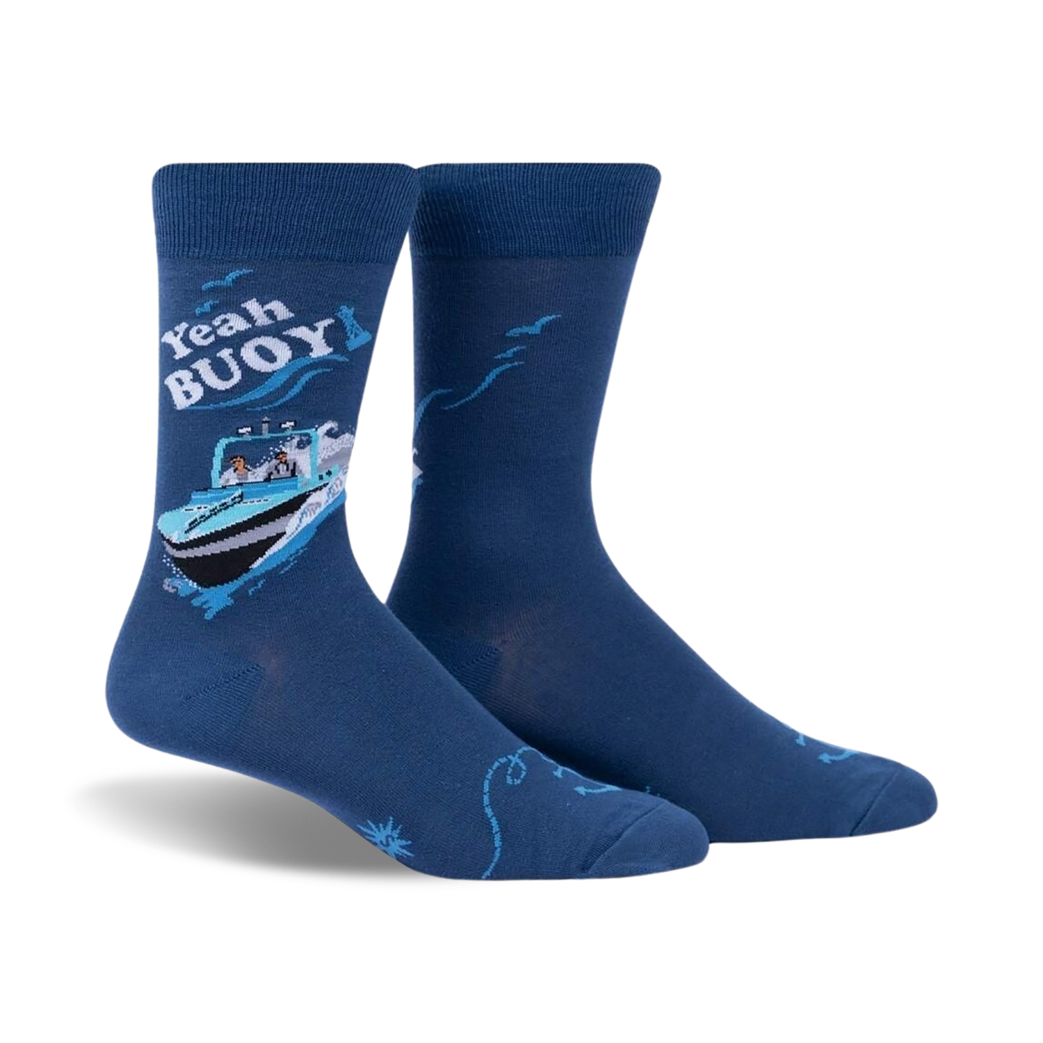 A pair of blue crew socks with a whimsical illustration of a boat, text that says 'Yeah Buoy!', and seagull accents.