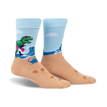 light blue crew socks with colorful dinosaur pattern on bottom half, featuring palm trees & waves in background.  
