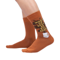 Lifestyle shot showing the socks on a person's legs, showcasing the fit and design.