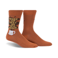 Pair of brown crew socks with a funny 'Woke Up Sexy As Hell Again' slogan and coffee cup graphic. Dark brown coffee spill design element.