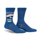 Pair of blue crew socks featuring a cream chihuahua graphic and 'Monday Mode On' text. 
