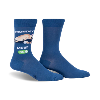 blue crew socks with "monday mode, on" illustration of sleeping cat with green "on" button.  