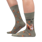Lifestyle shot of a person wearing the 'Let's Get Nuts' socks. Shows how the socks look when worn.
