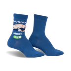 Pair of blue crew socks featuring a cream chihuahua graphic and 'Monday Mode: On' text. Fun, casual style.