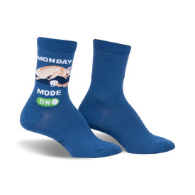 women's crew socks in blue feature cat napping on coffee mug with monday mode, on above and below graphic   