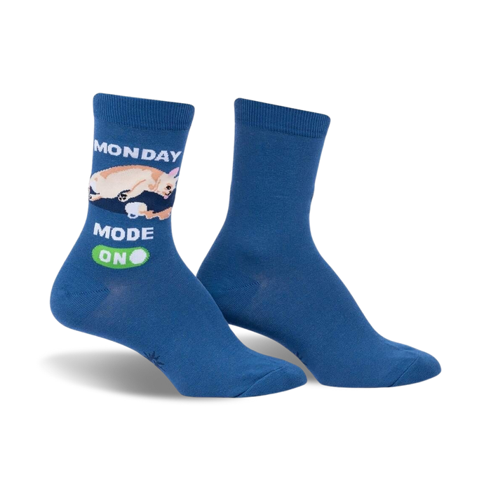 women's crew socks in blue feature cat napping on coffee mug with monday mode, on above and below graphic   