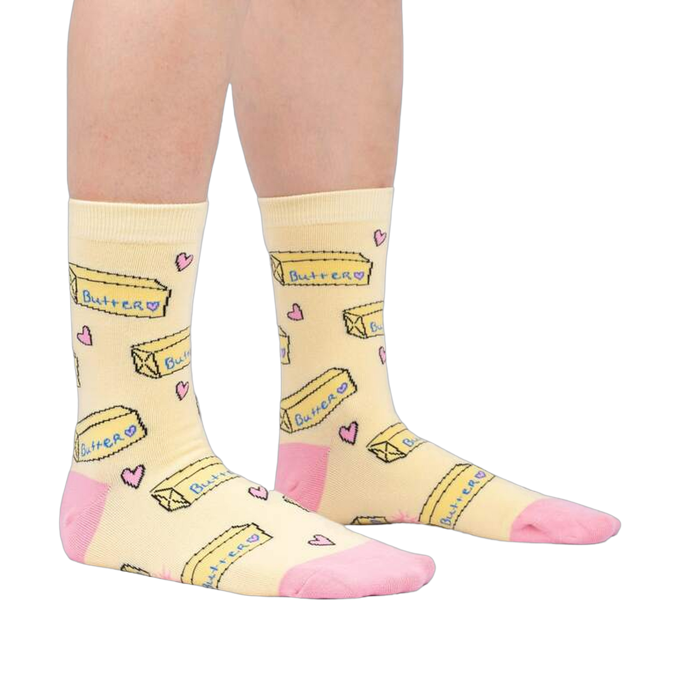 Lifestyle shot of a person's legs wearing the 'Butter Me Up' socks, showcasing the fit and overall style.
