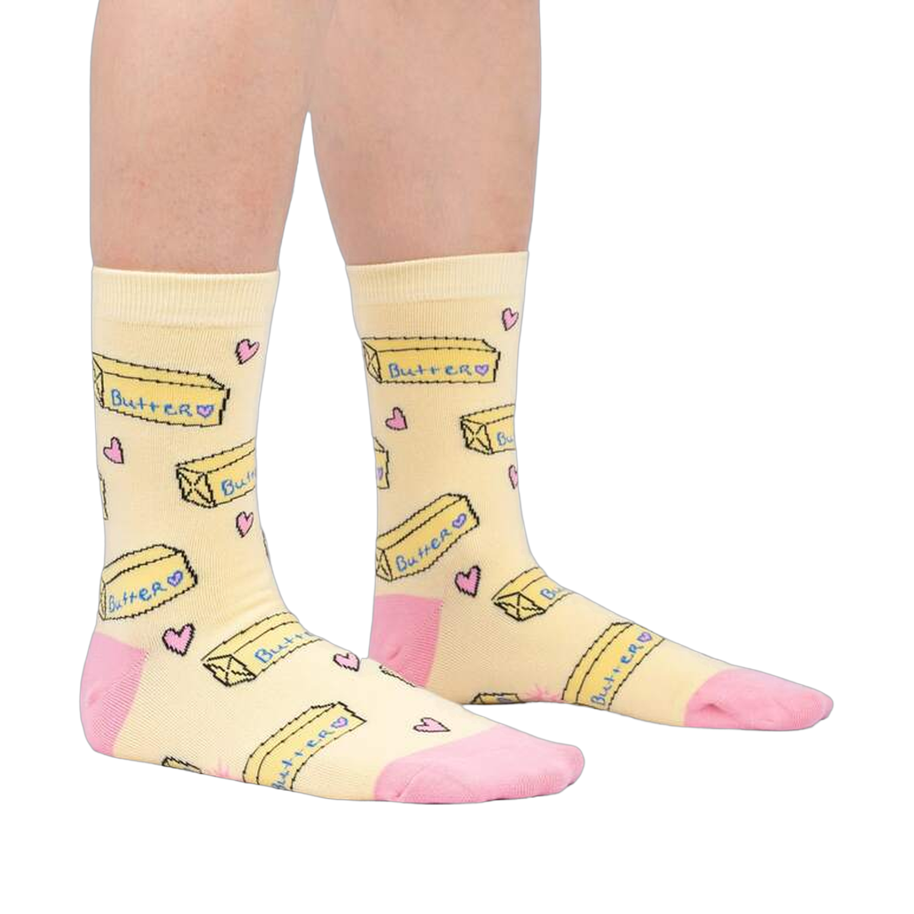 Lifestyle shot of a person's legs wearing the 'Butter Me Up' socks, showcasing the fit and overall style.