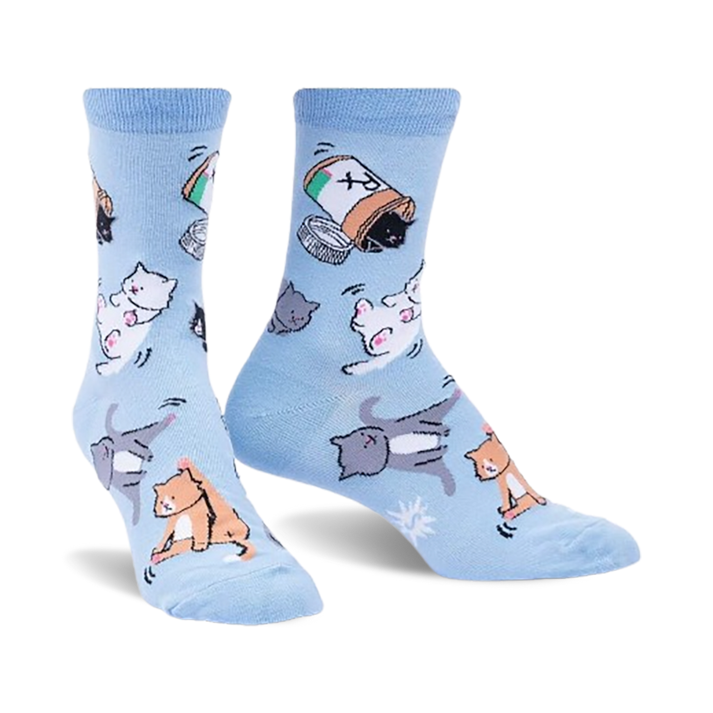 Pair of light blue crew socks with playful illustrations of cats tumbling out of a pill bottle. 