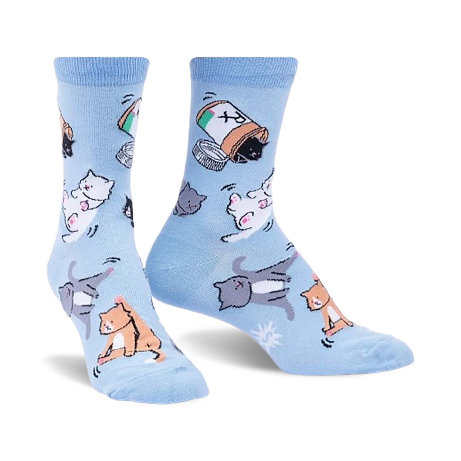 Pair of light blue crew socks with playful illustrations of cats tumbling out of a pill bottle. 