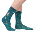 Lifestyle shot showing the socks on a person's legs, showcasing how they look when worn.
