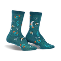 Pair of teal crew socks featuring a whimsical pattern of bees, flowers, a crescent moon, and stars.