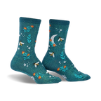 Pair of teal crew socks featuring a whimsical pattern of bees, flowers, a crescent moon, and stars.