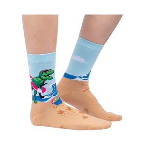 Lifestyle shot of Dinos Gone Wild socks on a person's feet, showcasing the beach-themed design.