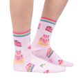 Lifestyle shot showing the socks on a person's legs, highlighting the fit and overall look.