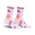 Pair of pink crew socks with rainbow stripes and whimsical cake and cupcake designs. 