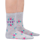 Lifestyle shot of a person wearing the 'WTF?' socks, showing the socks on their legs.