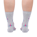 Back view of the 'WTF?' socks on a pair of legs, showcasing the design on the back of the socks.