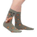 Lifestyle shot of 'Let's Get Nuts' socks on a person's legs, showing how the socks look when worn.